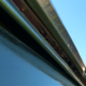 Rust holes around the rear glass.